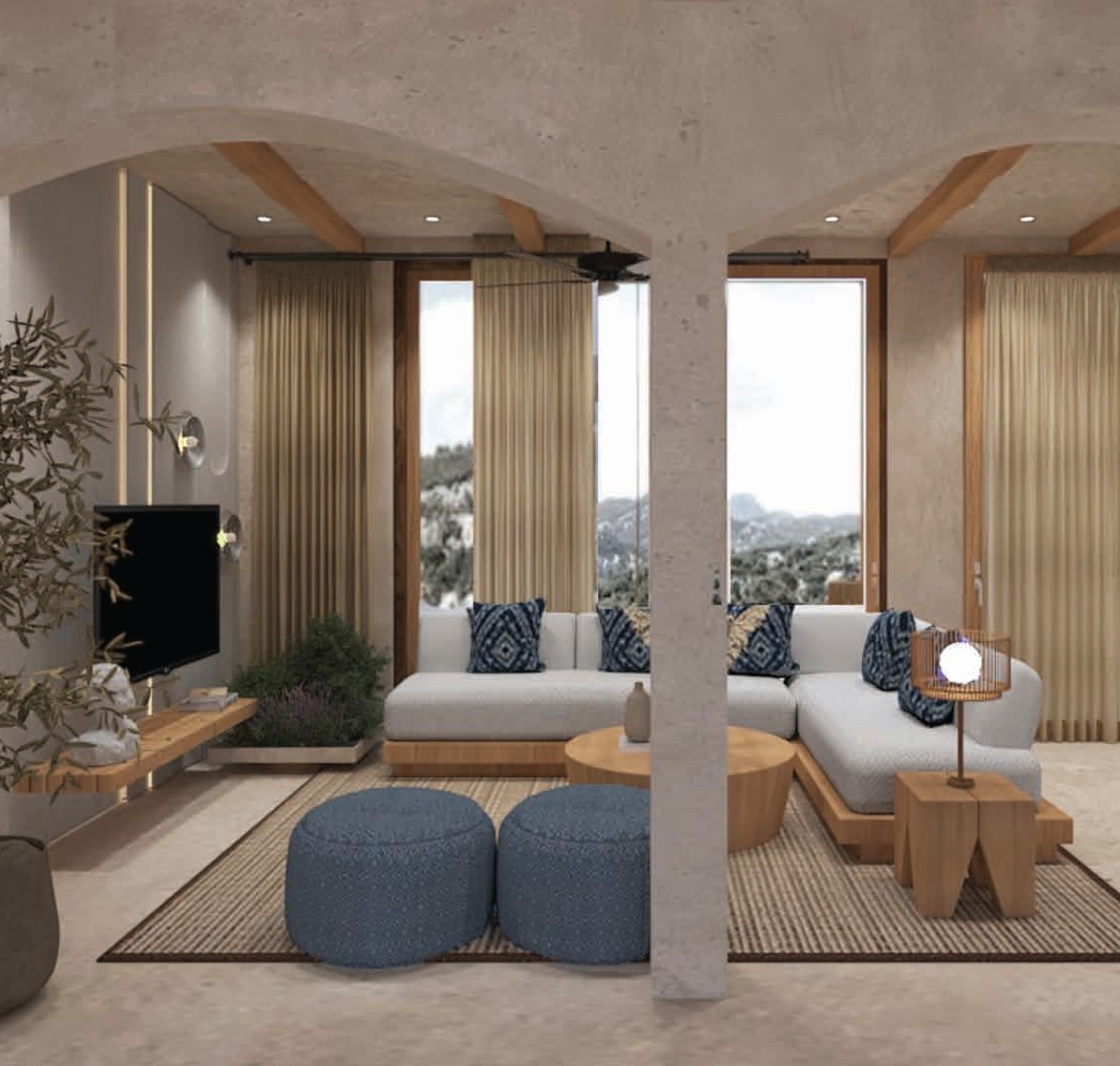 Morii, Salvador do Mundo — living room under a lime-washed arch, low sectional seating and full-height glazing onto the landscape