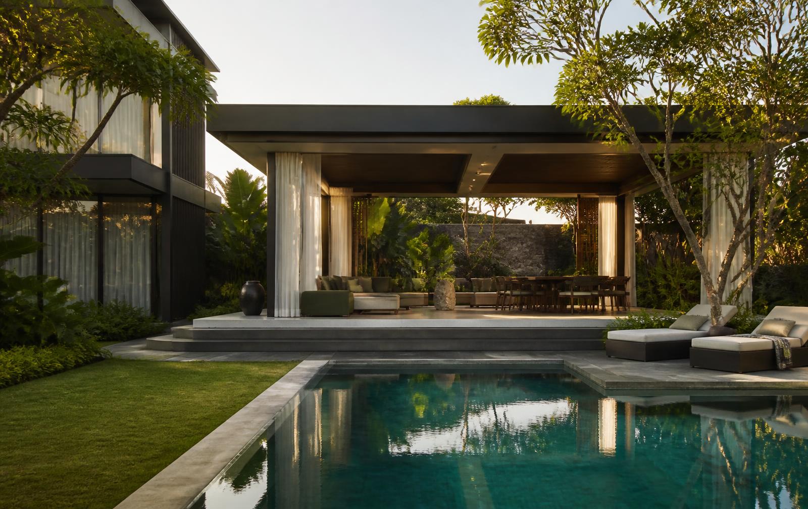 A private villa and pool at dusk